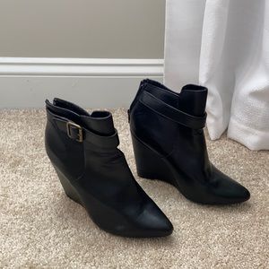 Black wedge boots with buckle